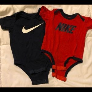 Nike baby onesies